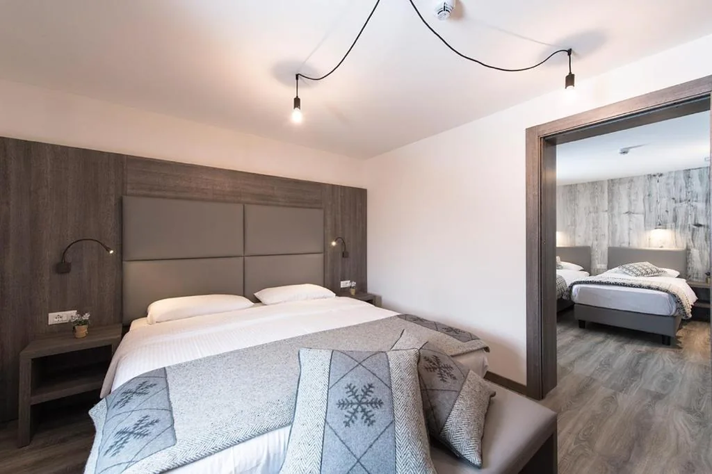 Camera Tripla — Hotel Pordoi Passo Pordoi Vegetarian Hotel