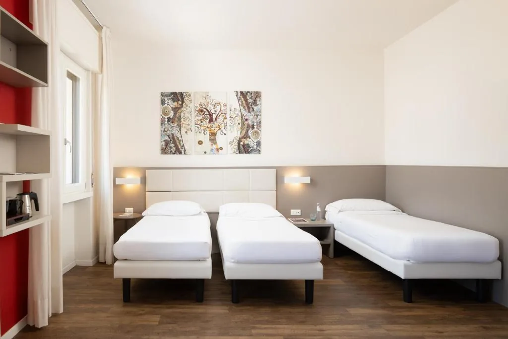Triple Room — Hotel Villa Claudia
