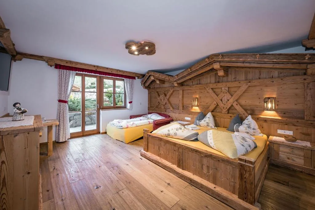 Standard Triple Room (3 Adults + 1 Child) — Chalets Almdorf Haidenberg