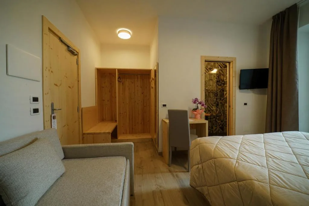 Camera Tripla Standard — GH Hotel Monzoni