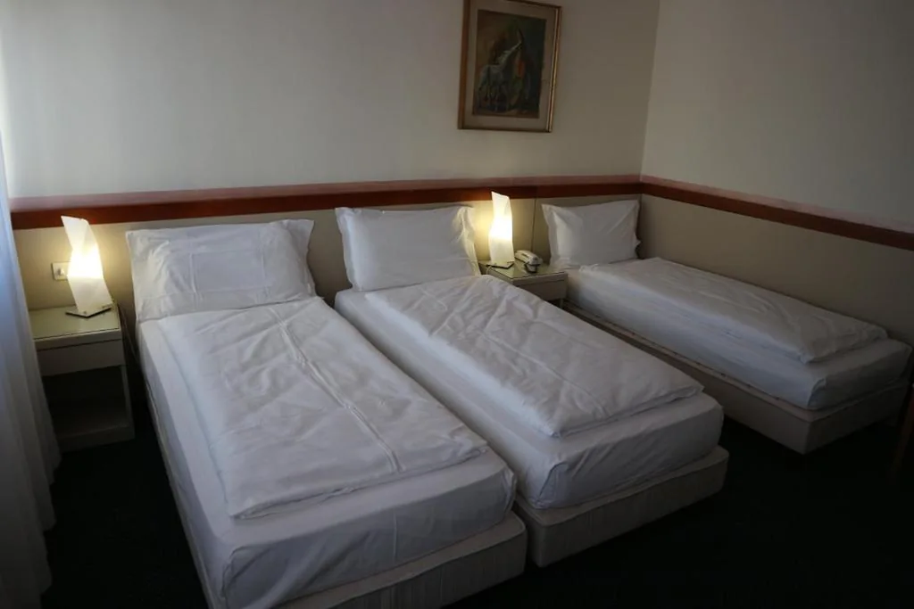 Camera Tripla Standard — Hotel Bristol