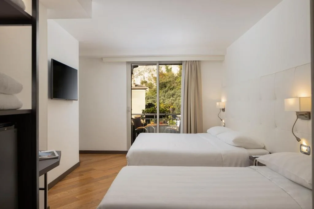 Camera Tripla Standard — Hotel Continental – Tonelli Hotels