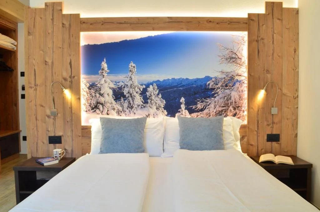 Camera Tripla Superior — Aria Alpina Guest House Affittacamere