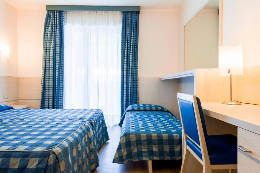 Camera Tripla Superior — Caravel Bike Hotel