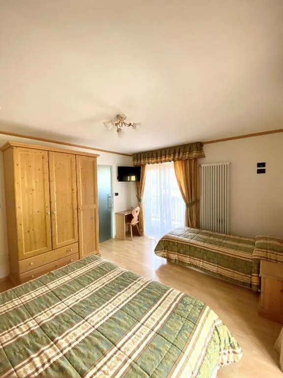 Camera Tripla Superior — Hotel Chalet Alaska