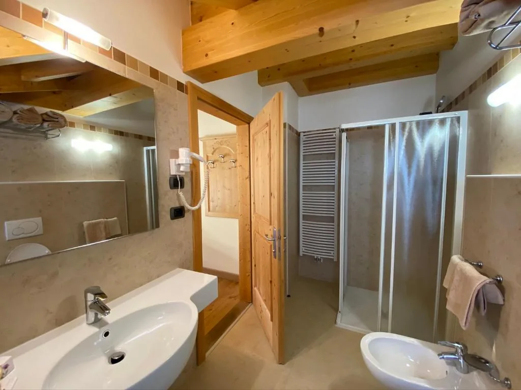 Camera Tripla Superior - Mansarda — Boutique Hotel Diana