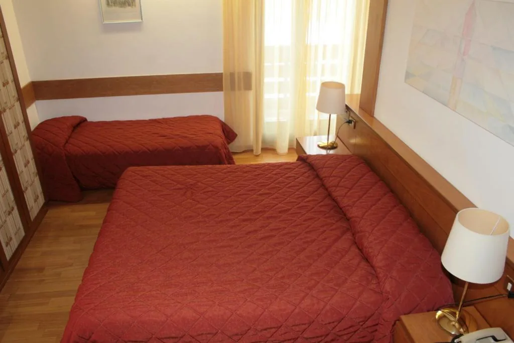 Due Camere Familiari Comunicanti — Hotel Cristallo