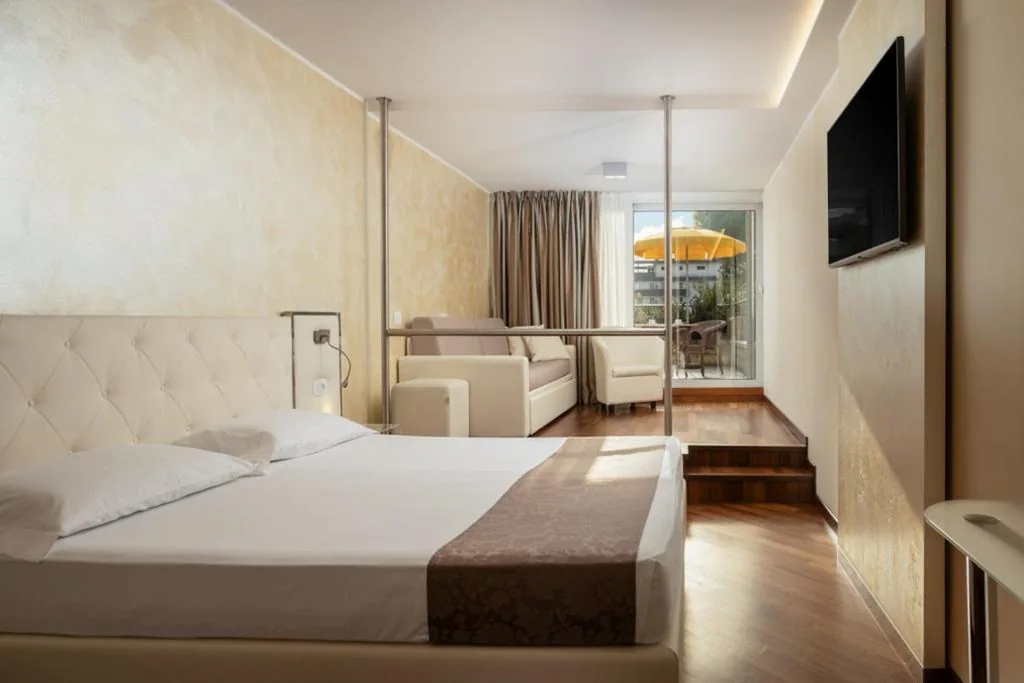 Junior Suite con Terrazza — Hotel Savoy Palace – Tonelli Hotels