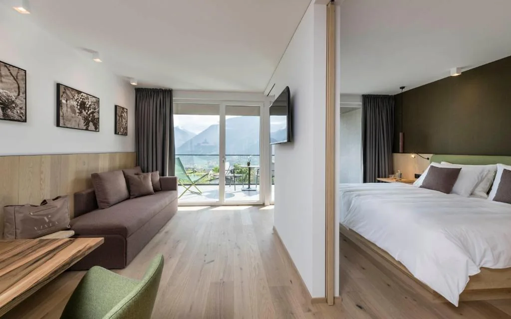 Junior Suite con Vista Piscina — Vinea – Suites