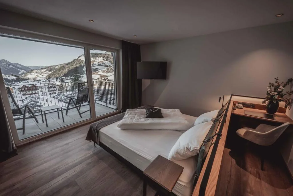 Junior Suite Deluxe — Hotel Continental Dolomites