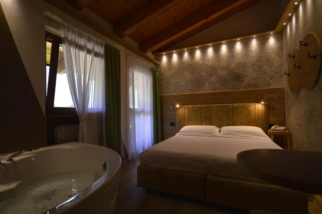 Junior Suite Deluxe — Hotel Villa Fosine Spa & Wellness