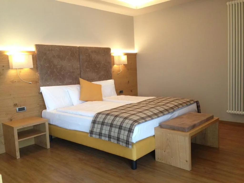 Junior Suite Familiare — Hotel Ambassador