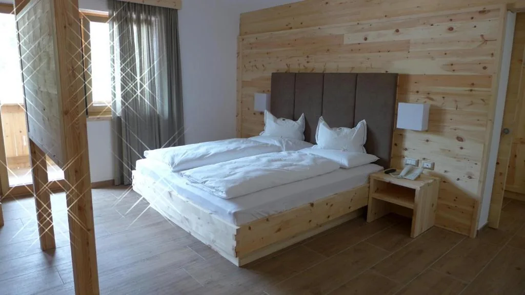 Junior Suite — Passo Sella Dolomiti Mountain Resort
