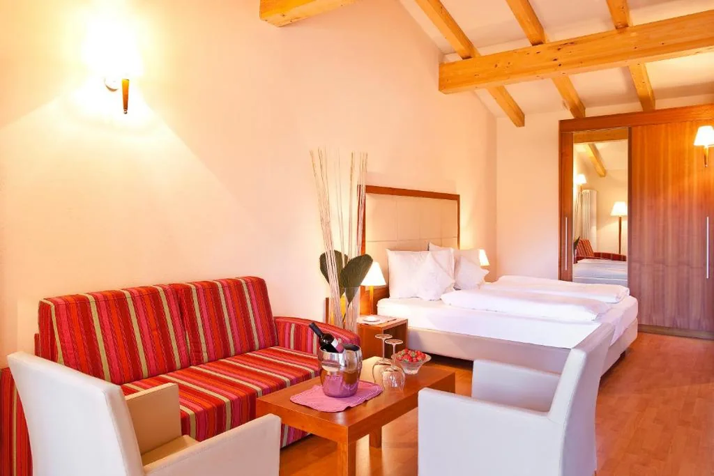 Suite con Balcone — Astor Hotel