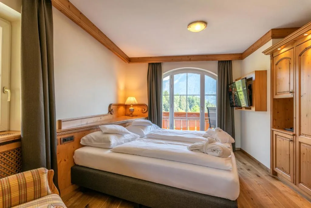 Suite con Balcone — Hotel Albion Mountain Spa Resort Dolomites
