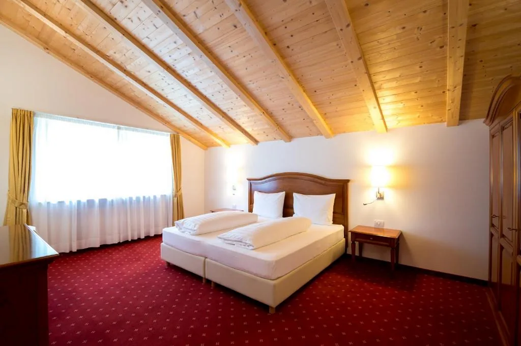 Suite con Balcone — Hotel Quellenhof
