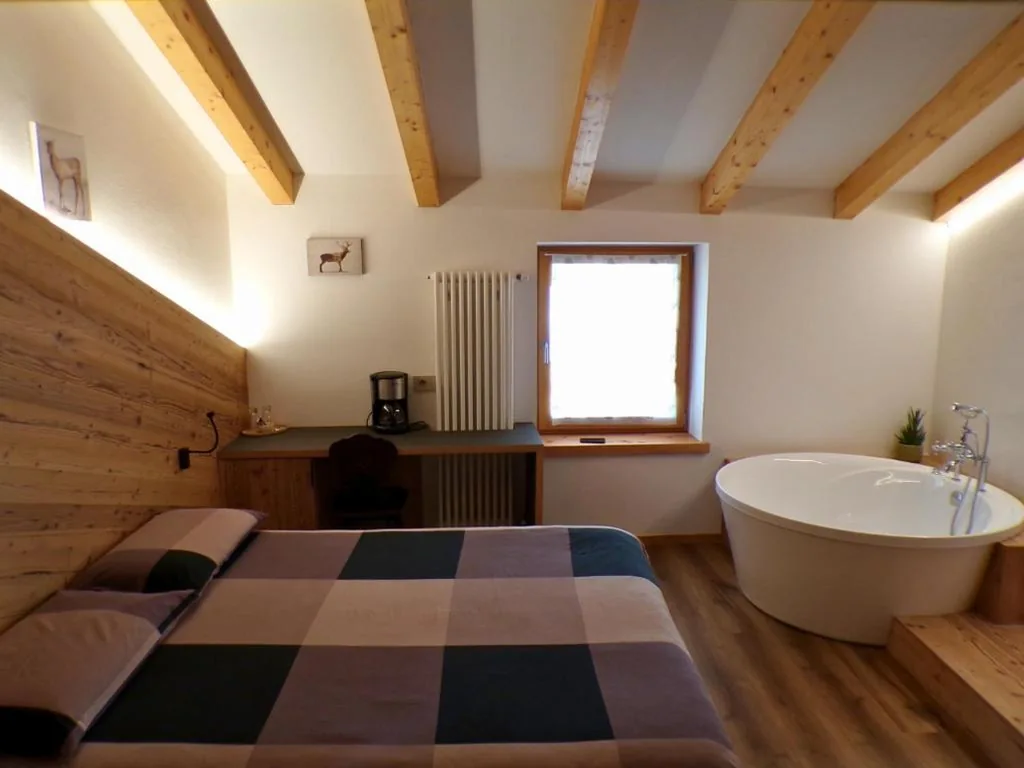 Suite con Vasca Idromassaggio — Agri B&B Paganella Relax and Gourmet