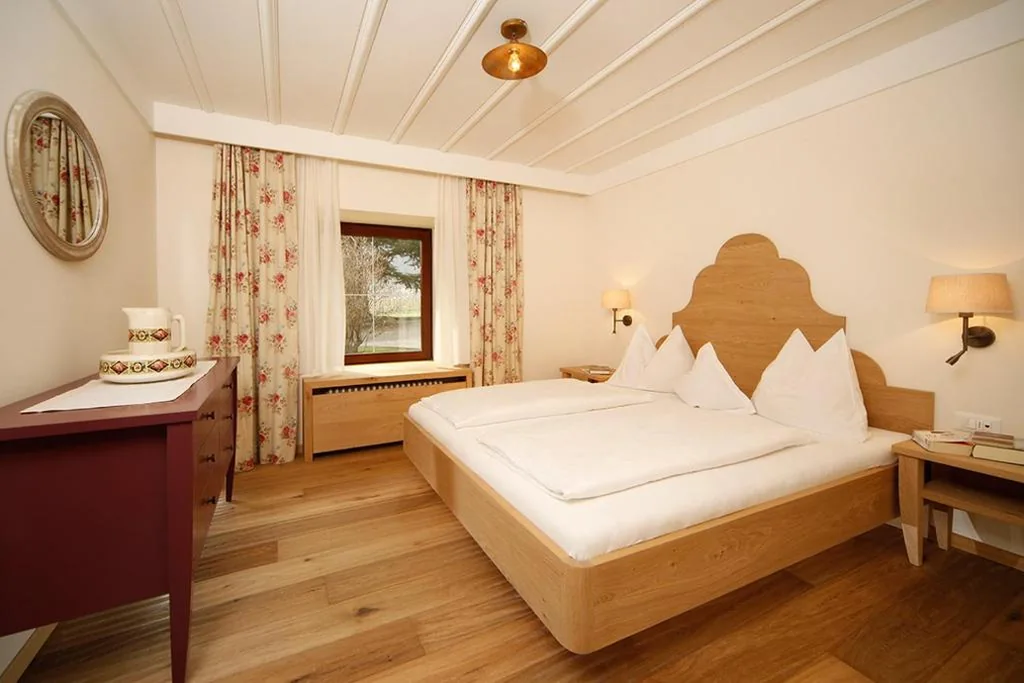 Suite con Vista Giardino — Ansitz Pünthof