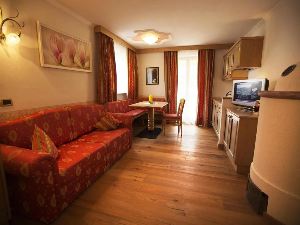 Suite con Vista Montagna — Hotel Garni Concordia – Dolomites Home