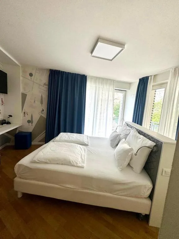 Superior Junior Suite with Terrace and Lake View — MySEELE Garda Active Hotel