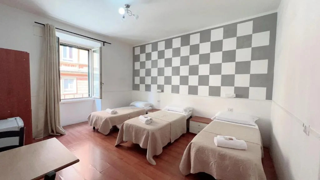 Triple Room with Outside Private Bathroom — Hi Termini