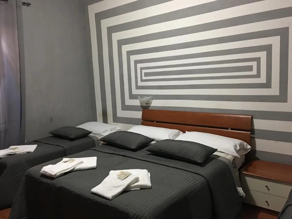 Triple Room with Outside Private Bathroom — Hi Termini