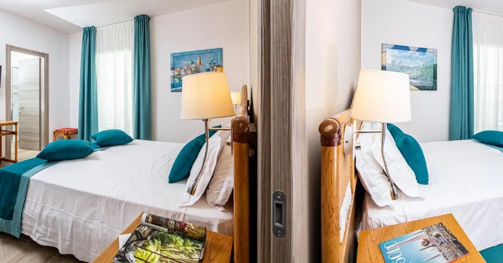 2 Camere Comunicanti — Hotel Capitol