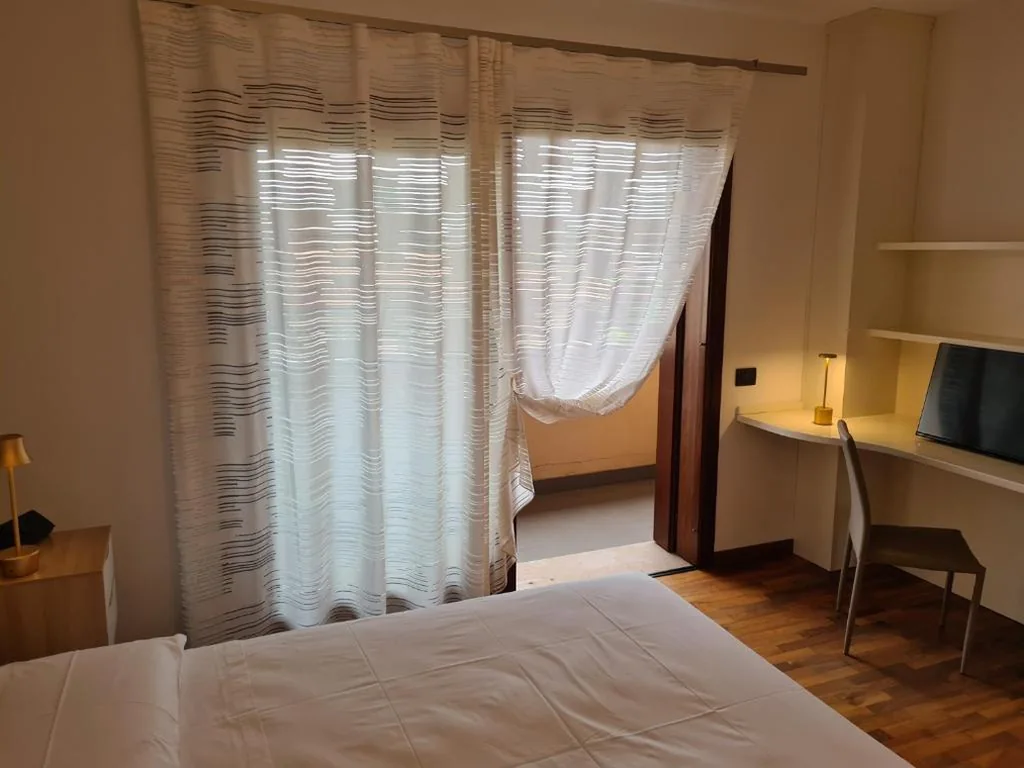 Camera Deluxe (2 Adulti + 1 Bambino) — Bed & Breakfast Rezzonico