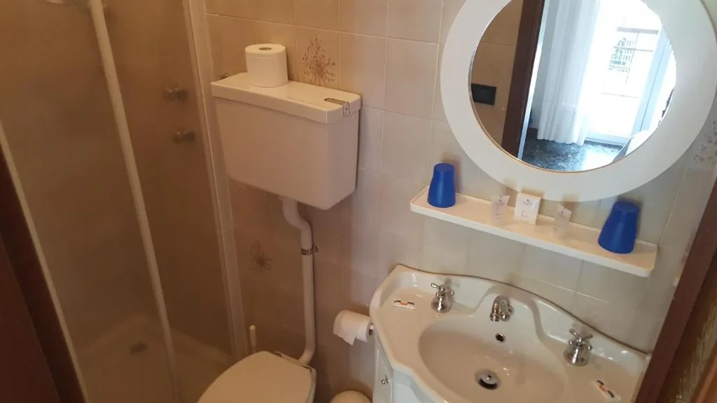 Camera Deluxe (2 Adulti + 1 Bambino) — Hotel Firenze