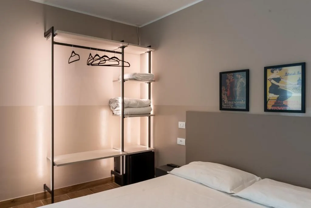 Deluxe Room (2 Adults + 1 Child) — M14 RESIDENZA BASSANELLO