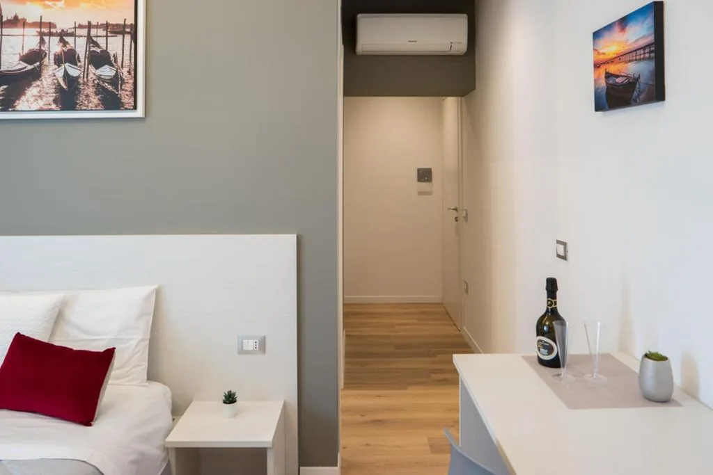 Camera Deluxe (2 Adulti + 1 Bambino) — Venice Rooms