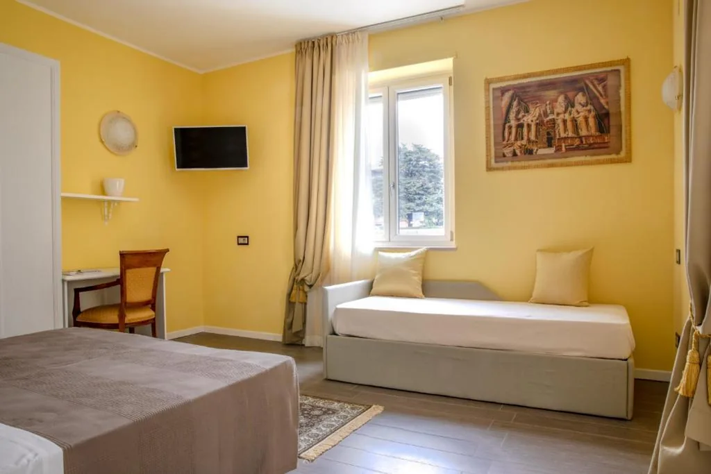 Camera Deluxe (2 Adulti + 1 Bambino) — Villa Luisa Rooms and Breakfast