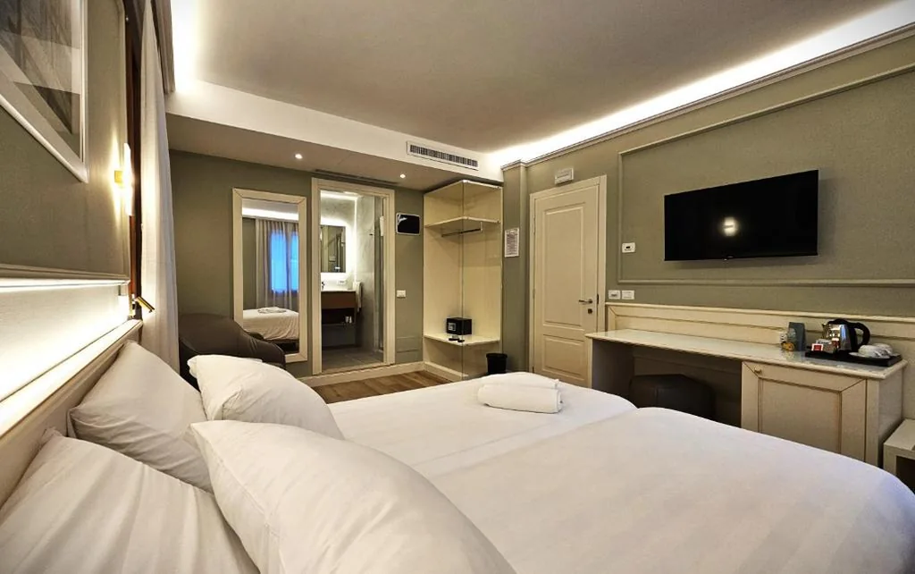 Camera Deluxe — Hotel Guerrini