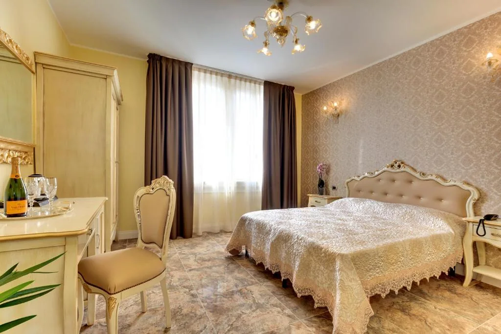 Camera Deluxe Matrimoniale/Doppia con Letti Singoli — New Reiter Hotel