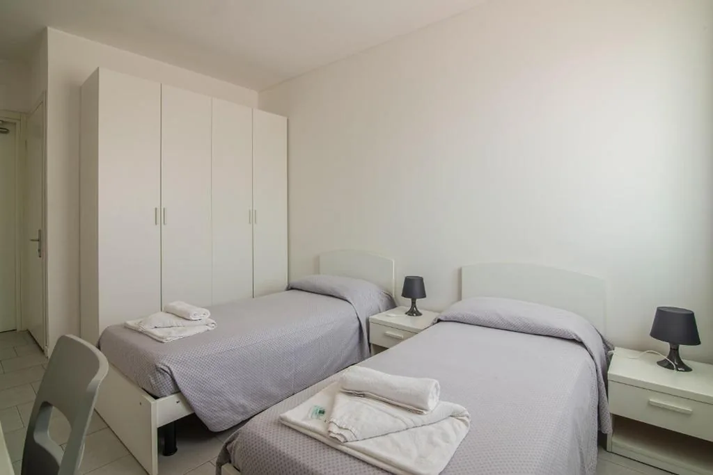 Camera Doppia con Letti Singoli — Casa Lucia Valentini Terrani