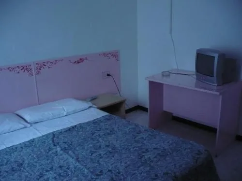 Twin Room — Hotel Adua
