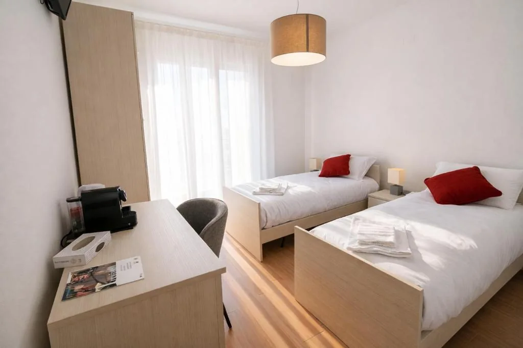 Camera Doppia con Letti Singoli — Villa Lucchetta – Tre Camere e Appartamento con parcheggio Interno
