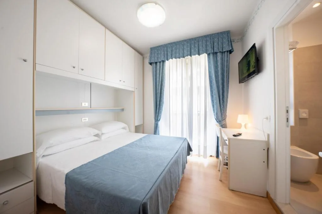 Camera Economy Matrimoniale/Doppia con Letti Singoli — Hotel Laurin