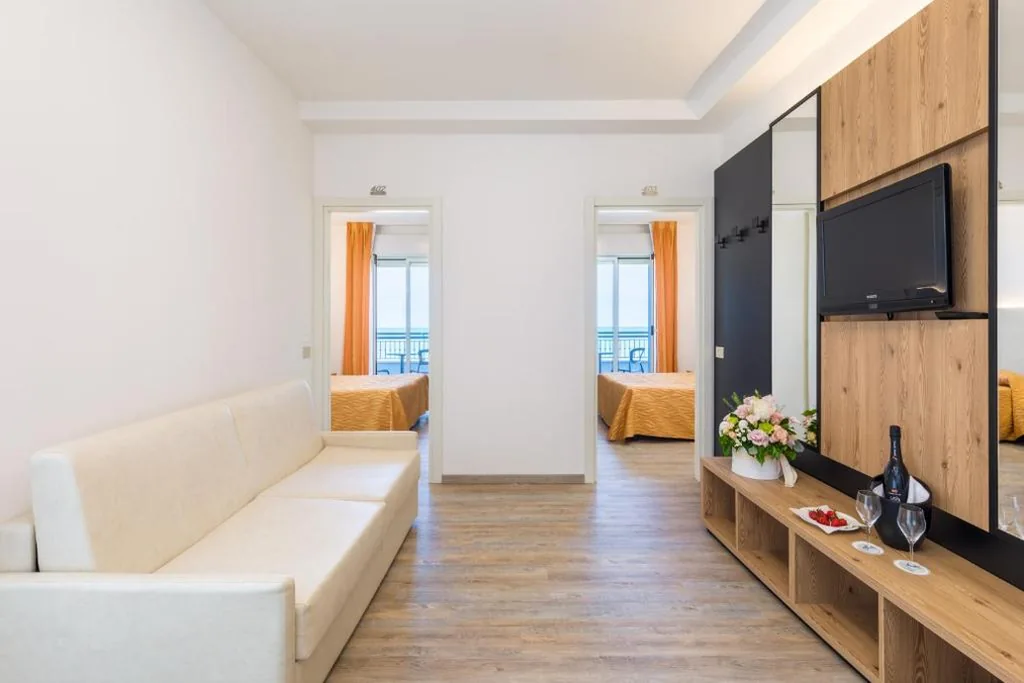 Camera Familiare (2 Adulti + 2 Bambini fino a 12 Anni) — Hotel Nettuno