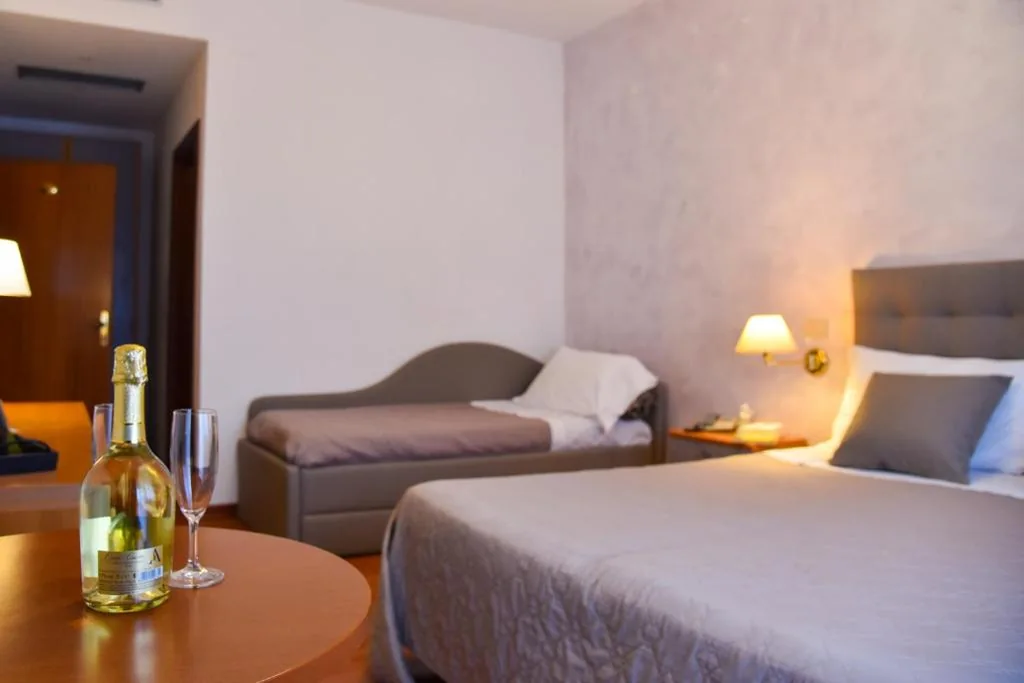 Family Room (2 Adults + 2 Children) — Hotel Crystal
