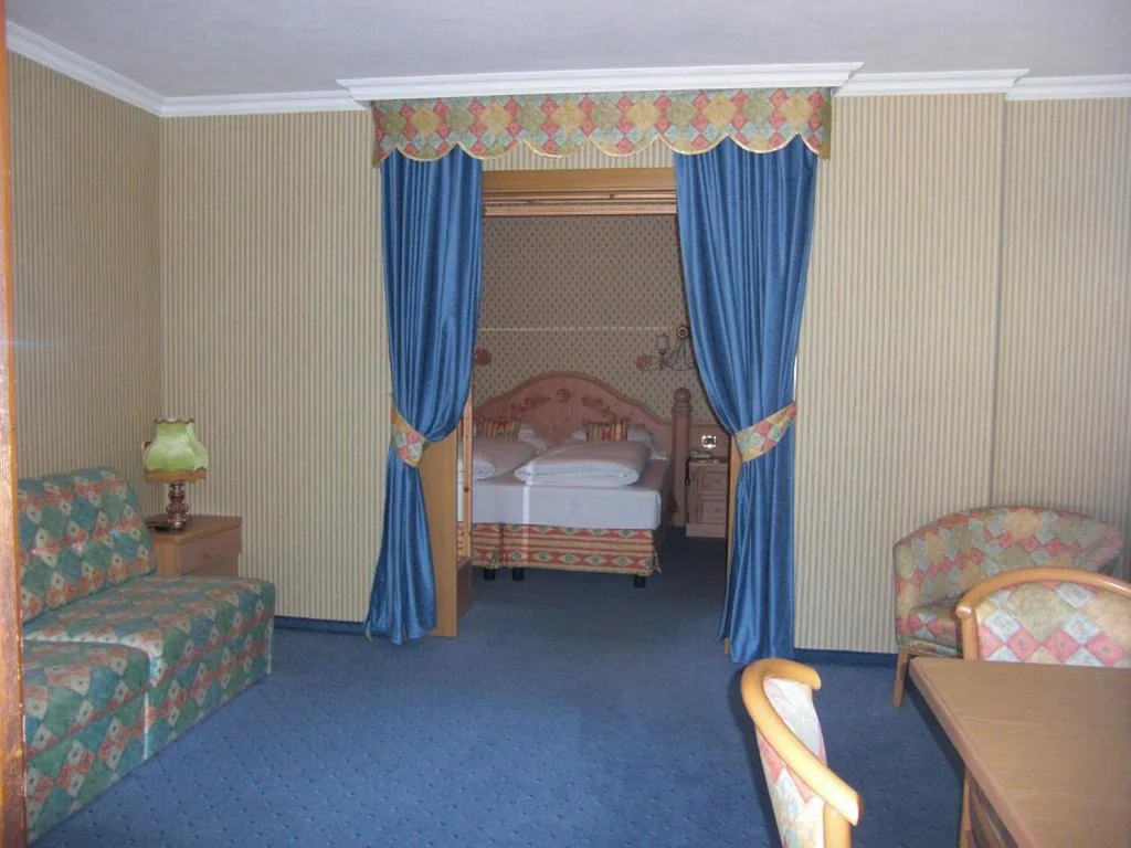 Family Room (2 Adults + 2 Children) — Hotel Evaldo
