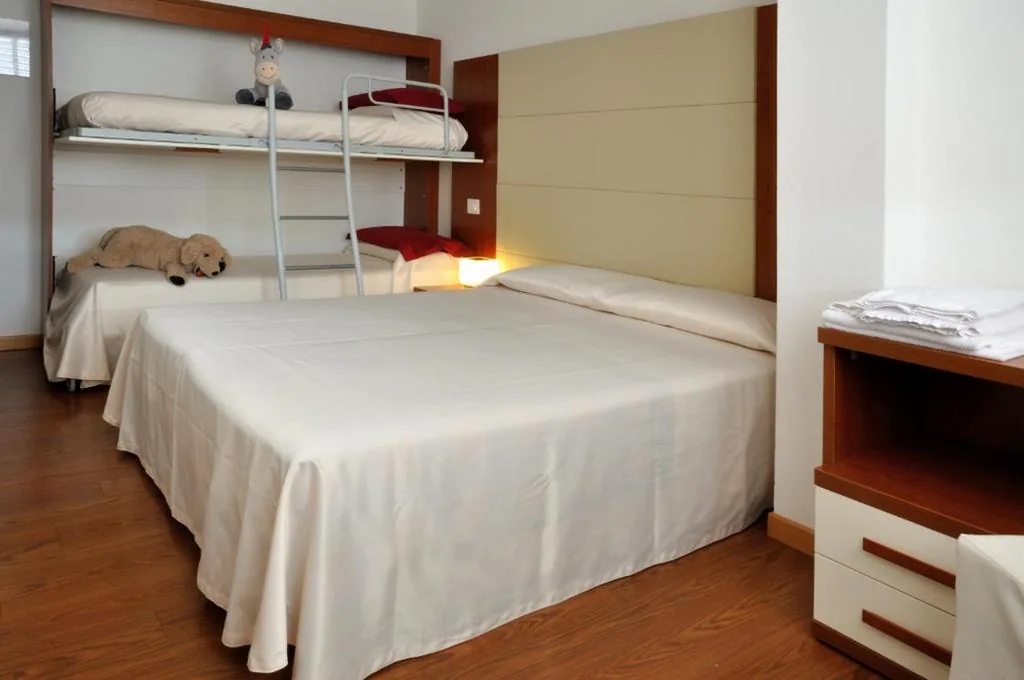 Family Room (2 Adults + 2 Children) — Hotel Mezzaluna