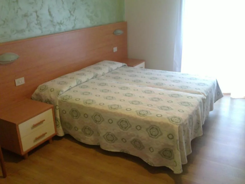 Family Room (2 Adults + 2 Children) — Hotel Rado