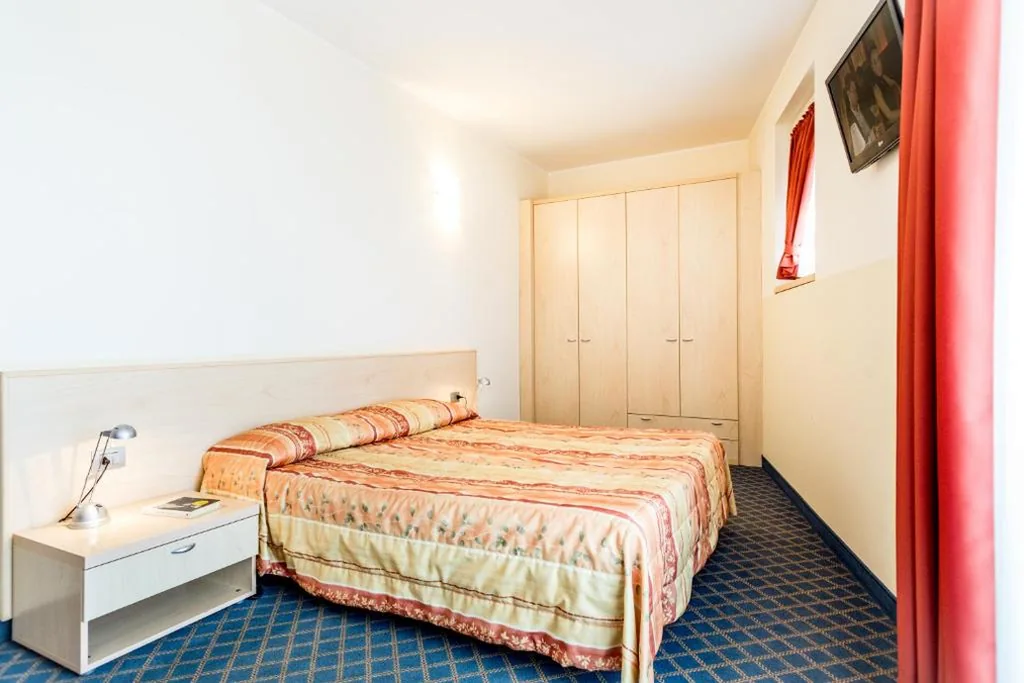 Family Room (2 Adults + 2 Children) — Hotel San Vito
