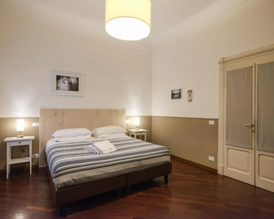 Family Room with Shared Bathroom — Dimora Giardino di Giulietta