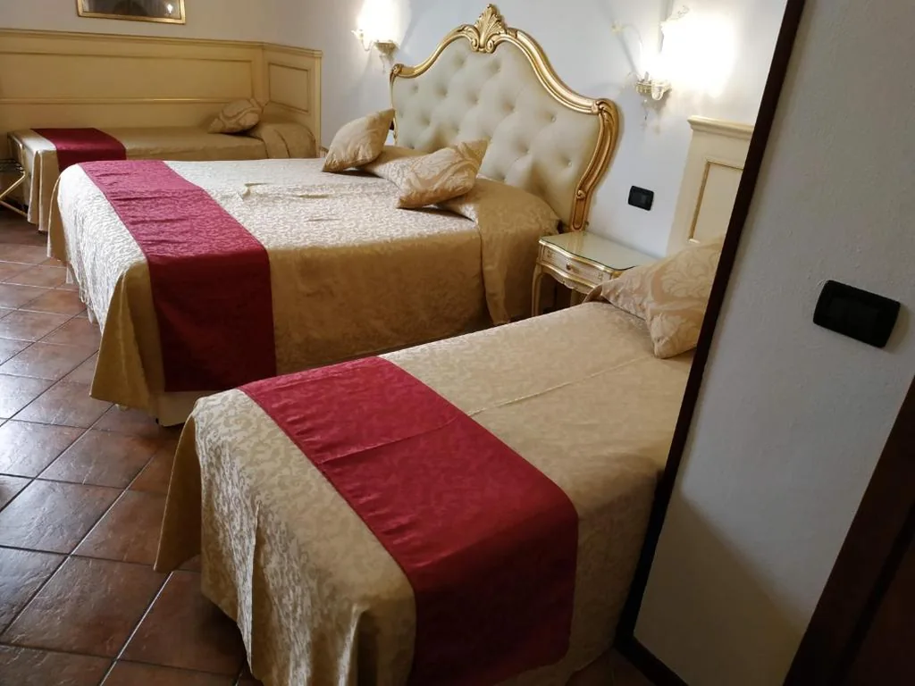 Family Room with Private Bathroom — Alloggi SS Giovanni e Paolo