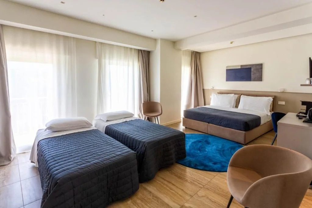 Camera Familiare con Terrazza — Hotel Petit Palais