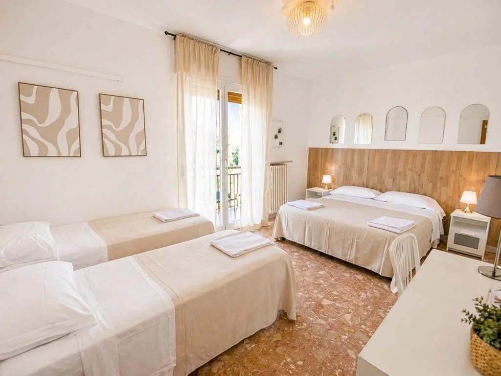 Family Room with Bath — Mariclà Boutique Rooms with Balcony & Free Parking