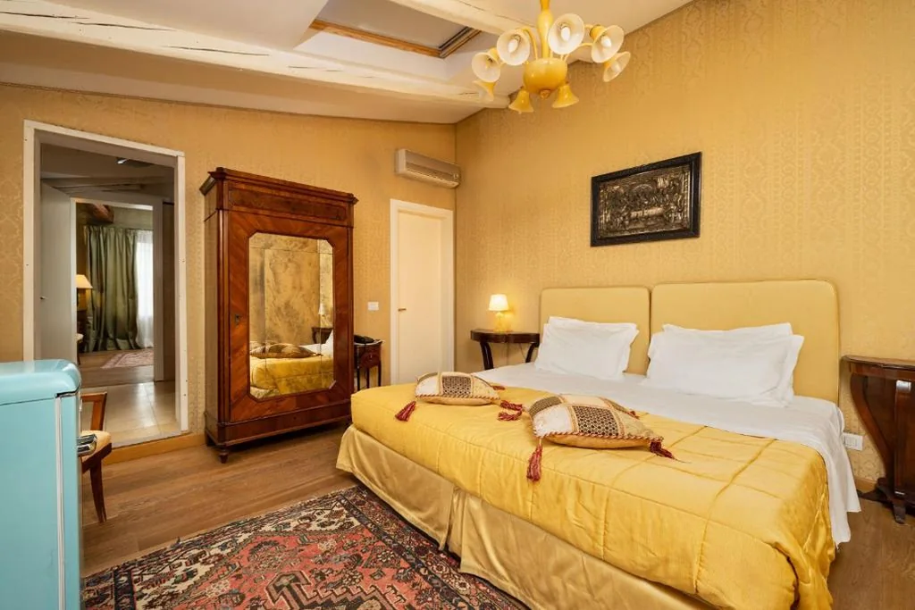 Camera Familiare con Vista Giardino — Relais Alberti
