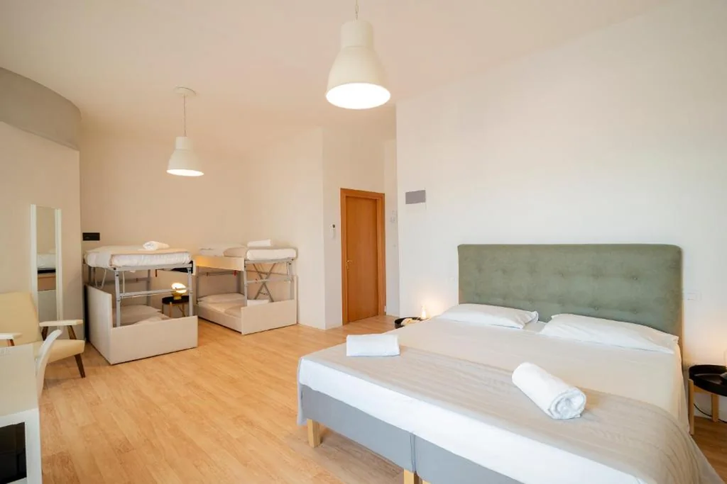 Camera Familiare Deluxe con Vista Mare Laterale — Hotel Concordia